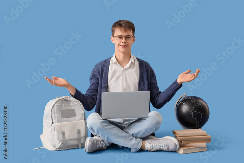 Male student with laptop st...