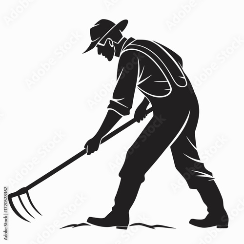 Farmer holding hoe silhouette