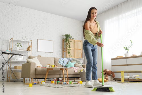 Tired mother with scattered...