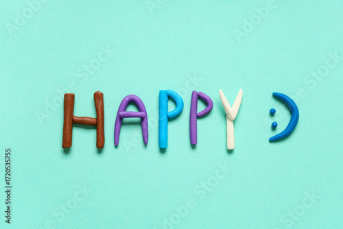 Word HAPPY made of play dou...