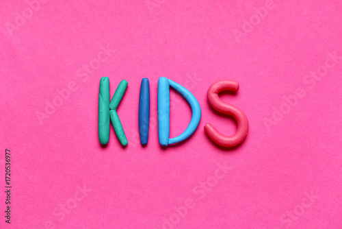 Word KIDS made of play doug...