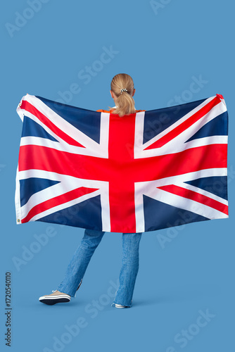 Young woman with UK flag on...