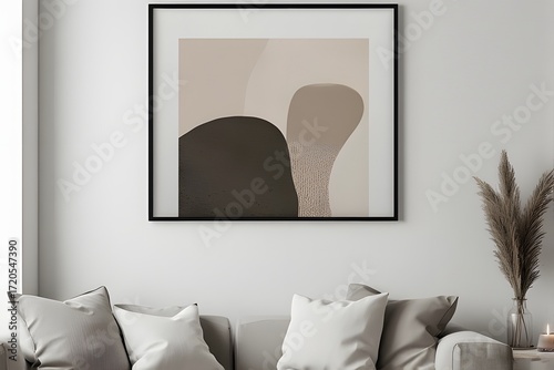 Modern living room featuring a stylish abstract art print with a neutral color palette creating a serene and minimalist aesthetic for home decor