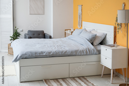 Comfortable bed, table and ...