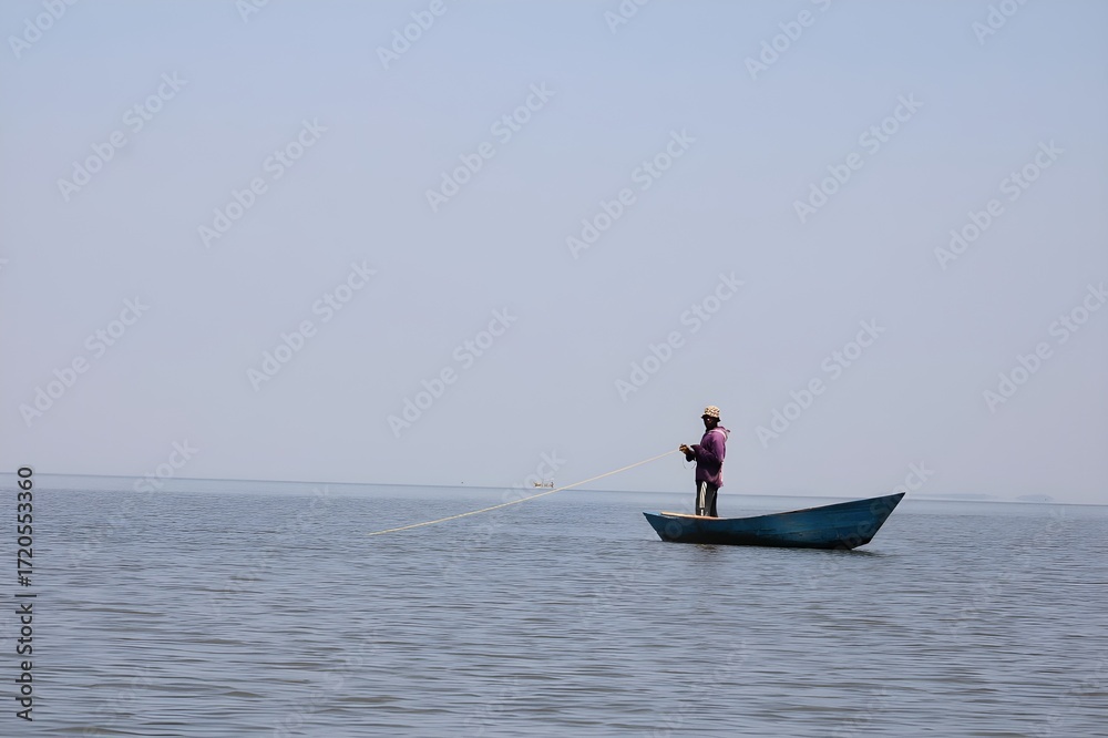 Naklejka premium fishing boat in the sea