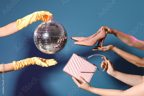 Female hands with disco bal...