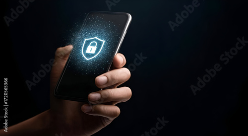 Wallpaper Mural A hand holding a smartphone displaying a digital lock, symbolizing security. Torontodigital.ca