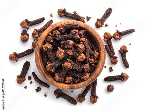 Fototapeta Naklejka Na Ścianę i Meble -  Aromatic spice cloves in a wooden bowl