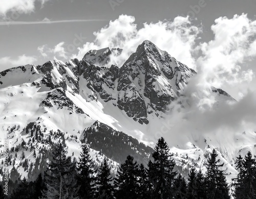 Winter Mountain Peaks in Cloudy Sky