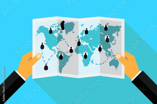 Hands holding a world map with people icons representing global connections and distribution