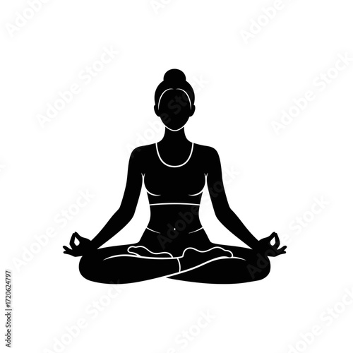 Black silhouette of a woman meditating in a lotus yoga pose, representing peace and mindfulness and healthy living.