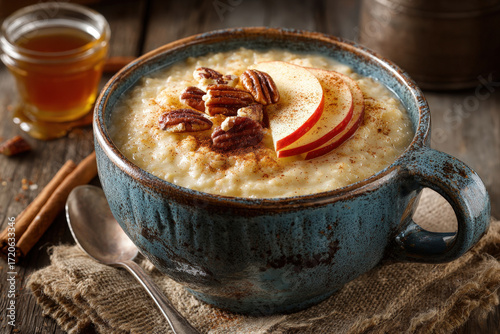 Healthy breakfast with oats, nuts, and fresh sliced smart device on white table