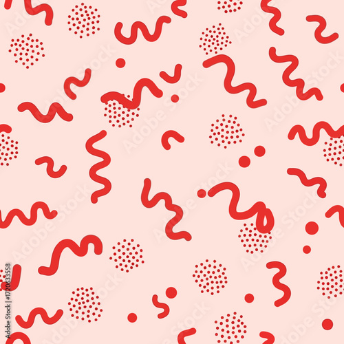 Playful red shapes and dots seamless pattern design background creating visual interest with a