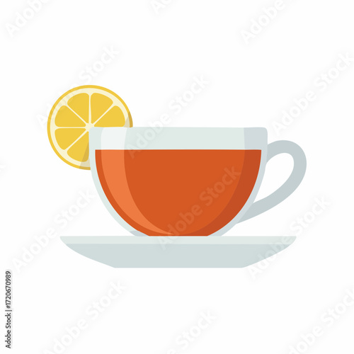 Aromatic tea in a glass cup with a lemon slice on a white saucer.