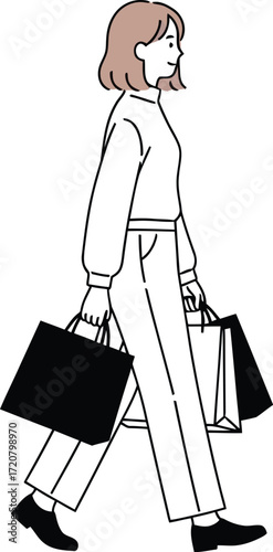 Woman with shopping bags walking with a sense of purpose and satisfaction