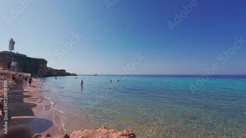 People at Red sea resort. Beach of tropical sea resort. Sharm El Sheikh, Egypt