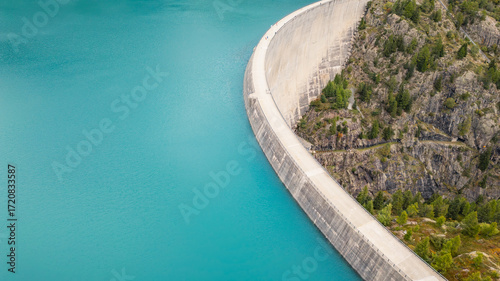 Aerial panoramic view of Emosson Dam and Lake in the Swiss Alps, renewable hydropower reservoir and mountain landscape, sustainable clean energy infrastructure