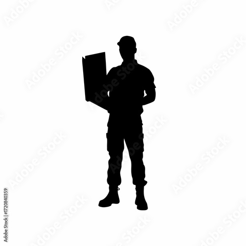 Technician holding shield icon projection in front of computer silhouette