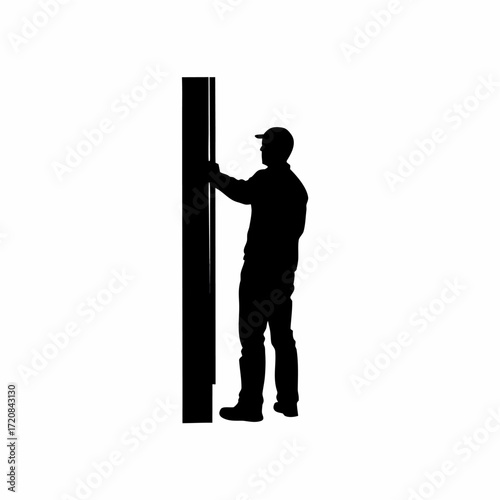 Technician placing caution sign in server room silhouette