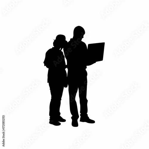 Silhouette of two technicians working together on a single computer