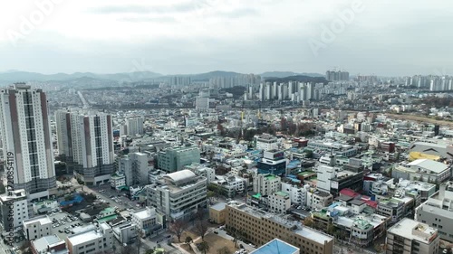 A panoramic view of Cheongju-si, Korea, and an urban aviation view with apartments and government offices