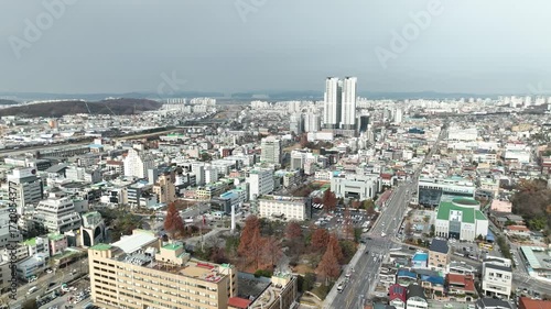 A panoramic view of Cheongju-si, Korea, and an urban aviation view with apartments and government offices