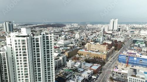 A panoramic view of Cheongju-si, Korea, and an urban aviation view with apartments and government offices