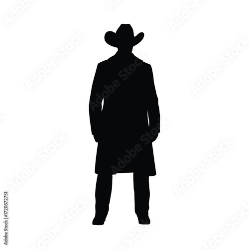 Silhouette of a cowboy in a long coat and hat