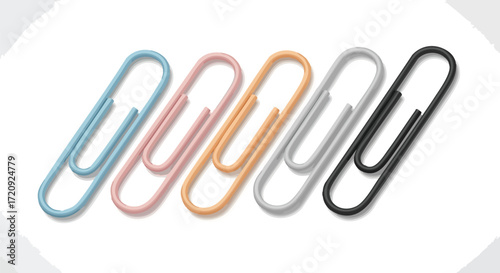 Colorful paper clips lined up on a white surface.