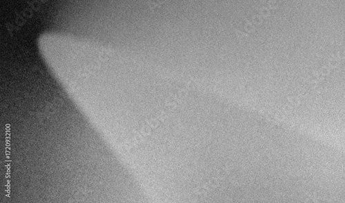 Stippled grain texture background. Black sprayed dots gradient wallpaper. Rough noisy sand dotted backdrop.