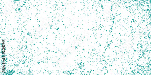 Blue water drops splash on a clear glass, creating a liquid texture and abstract pattern