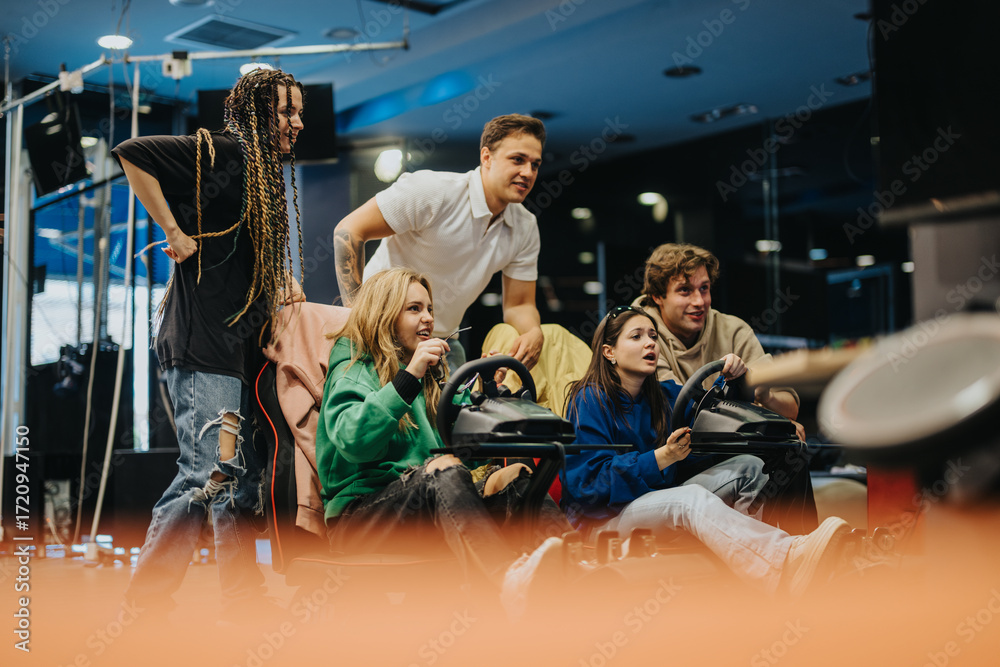 Fototapeta premium A group of friends engaged in a fun and interactive racing simulator game inside an entertainment venue, showcasing bonding and enjoyment.