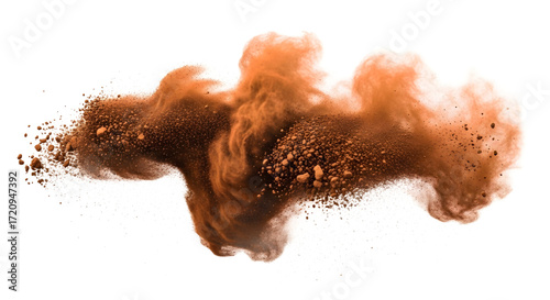 Explosion of brown, earthy powder creating a dynamic dust cloud of fine particles isolated on a white background