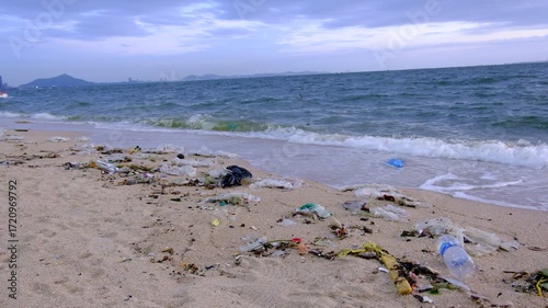 Dirty sea sandy shore ,Environmental pollution,
Plastic water bottles pollution in ocean (Marine debris)