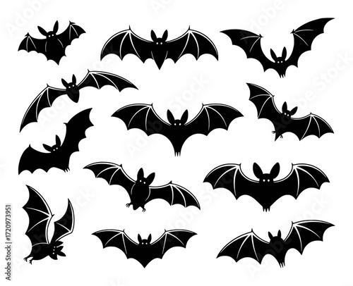 Collection of Silhouetted Bats in Various Flying Poses