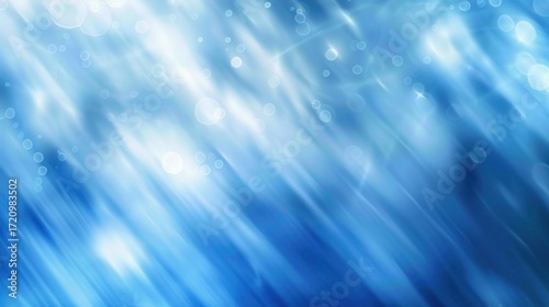 A blue and white abstract background with a gradient effect.