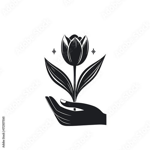Hand holding a tulip flower in minimalist black and white design  