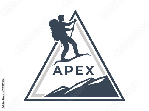 Silhouette of a climber reaching the mountain apex.