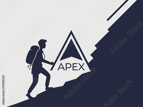 Silhouette of a climber reaching the mountain apex.