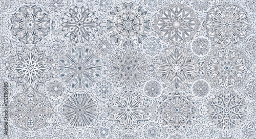 A sophisticated seamless pattern of various gray snowflakes on a light gray background, creating a subtle and modern winter design.
