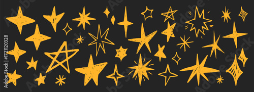 Golden star shapes with grunge texture and crayon spark elements on dark background for decorative design. Hand drawn celestial symbols with rough edges and various shapes for holiday projects.