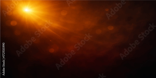 An abstract, fiery orange sunset with glowing light rays shining through dark clouds in the sky