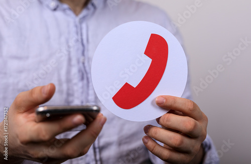 Stock photo of a person hol...