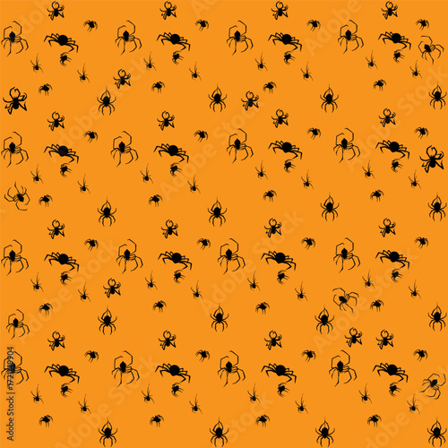 Seamless repeating Halloween pattern of simple black spider silhouettes evenly distributed on a vibrant orange background