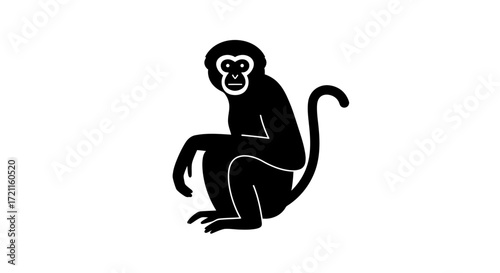 Stylized silhouette of a monkey sitting with detailed facial features on a
