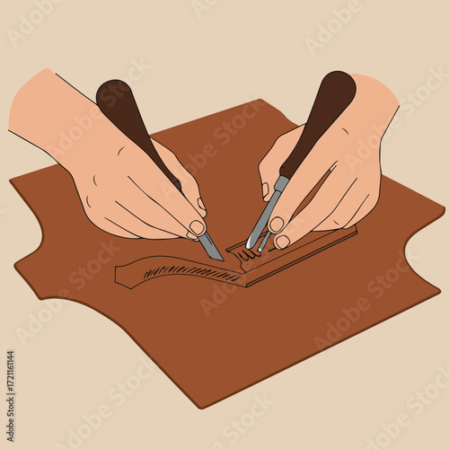 Leather tooling hands carve design into brown leather using sharp tools