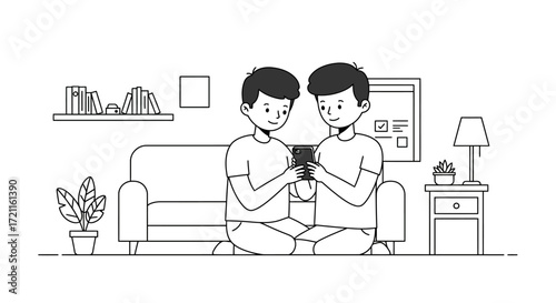 Two young men sit together on the floor playing a mobile game in a living room.