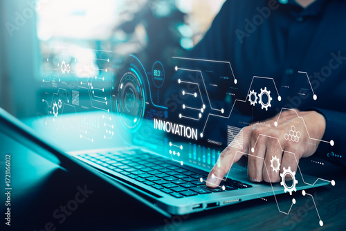 Innovation with Graphical User Interface Concept, businessman pointing on a virtual panoramic screen. Innovative ideas presented by management consultants on-screen, design, invention development