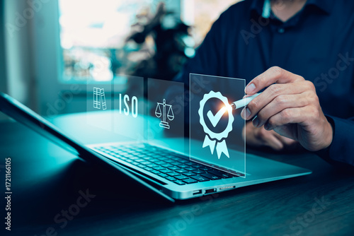 Quality assurance of business services, Businessman Hand shows the sign of the top service Quality assurance in Black background , Guarantee, Standards, ISO certification and standardization concept.