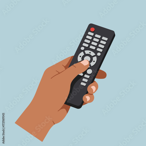 Hand holding black TV remote with light gray buttons on pale blue backdrop